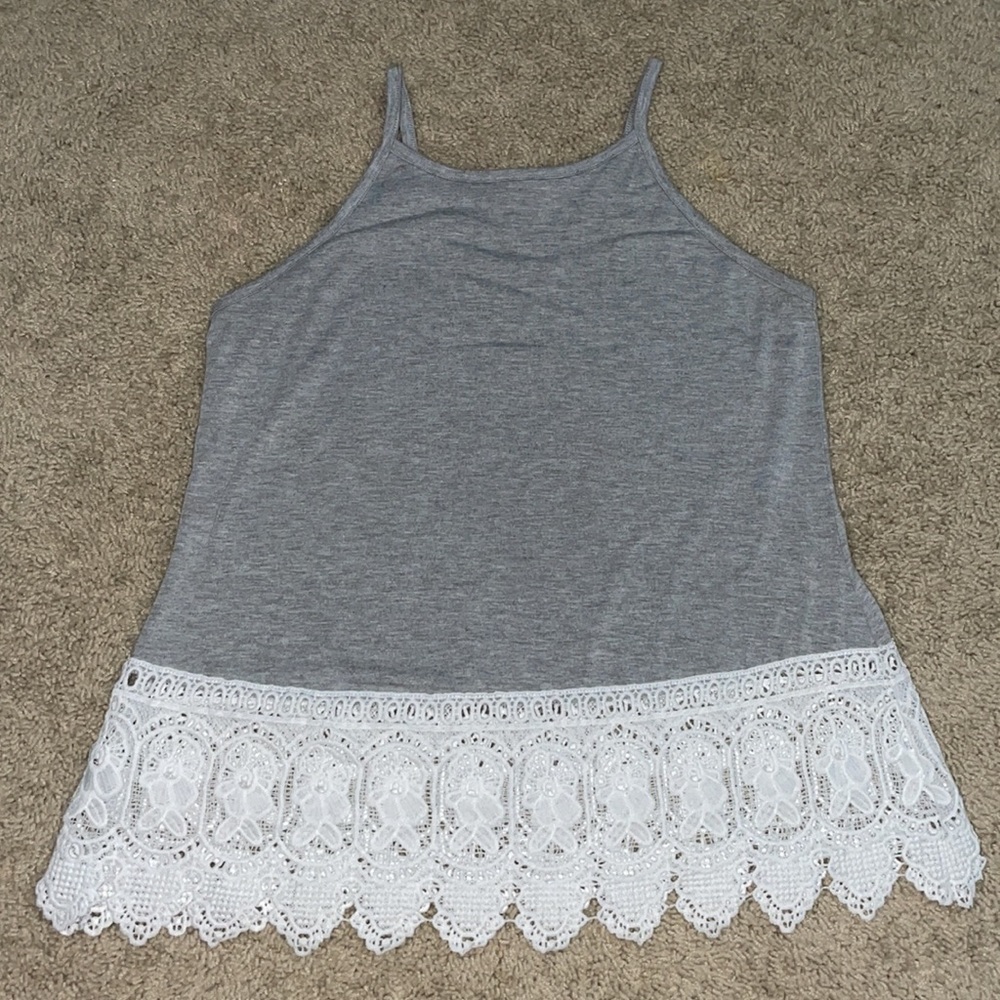 Gray tank top with white lace at the bottom